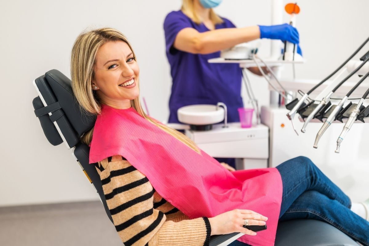 Patient receiving dental treatment in the dental chair at a Lenexa dental practice.